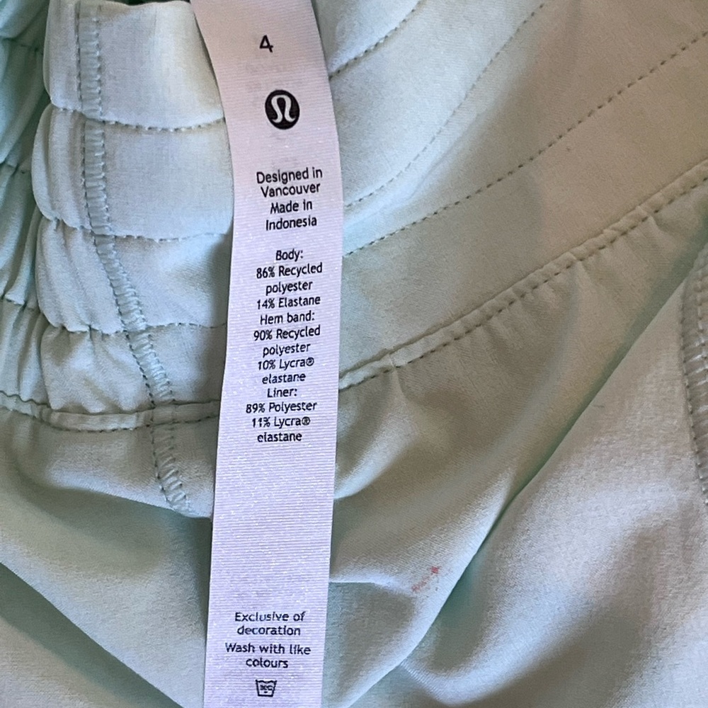 Lululemon activewear shorts in a light sea foam green